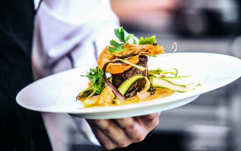 man holding a food plate