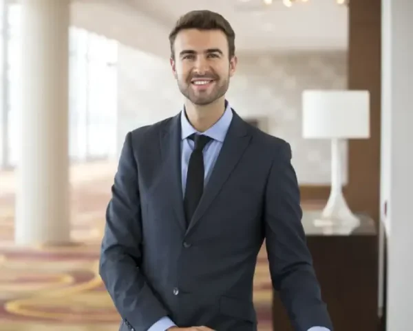 a man in formal dress standing